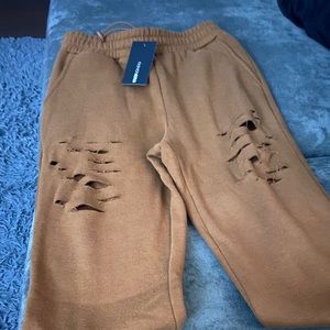 Distressed sweat pants